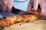 cutting fresh bread