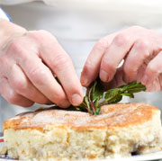 garnishing an apple cake